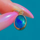 Glowing 9ct Gold Blue Opal Doublet Charm Pendant
