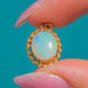 Anhänger aus 9ct Gold mit 2,00ct ovalem Opal und Kordelrand