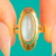 Deutscher Art Deco Goldring mit Mondstein-Cabochon im Navette-Schliff, 1,85 ct