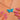 John Atkins & Sons Art Deco Powder Blue Enamel Butterfly Pendant, close-up worn at the neckline