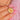 Angled close view of the textured Gold Augis medallion