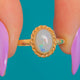 Zarter 9ct Goldring mit Opal und Kordelrand