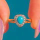 9 Karat Goldring mit Türkis und Diamant im Herzdesign
