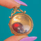 Antikes Shaker-Medaillon aus 9ct Gold mit losen Granaten