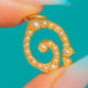 Victorian 18ct Gold Egyptian Revival Pearl Eye / Swirl Charm